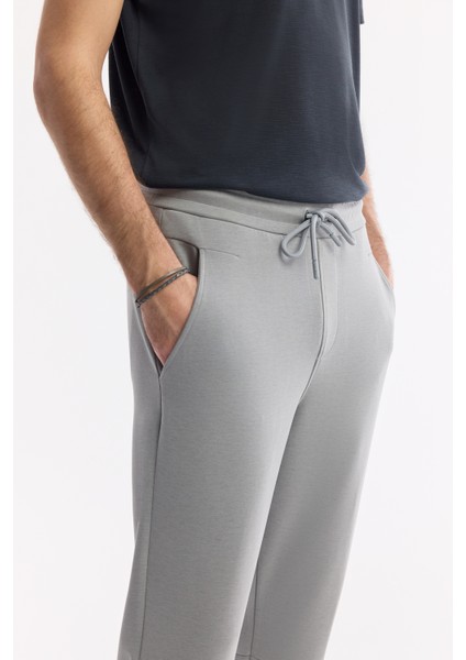 Erkek Gri Beli Lastikli Bağcıklı Yandan Cepli Flexi Baskı Detaylı Parçalı Soft Touch Jogger A51Y3402