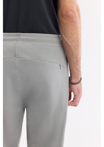 Erkek Gri Beli Lastikli Bağcıklı Yandan Cepli Flexi Baskı Detaylı Parçalı Soft Touch Jogger A51Y3402