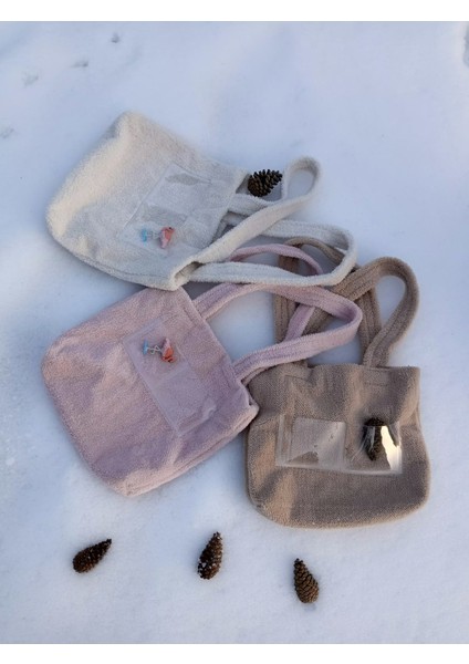 Krem-Kahverengi Pvc Cep Detaylı Peluş Kol Çantası fiyatları