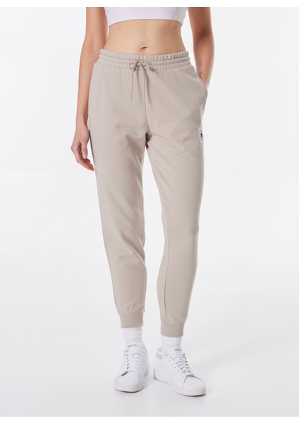 Core Chuck Patch Pant Ft Papyrus Bej Kadın Lastikli Paça Lastikli Bel Regular Fit Eşofman Altı modelleri