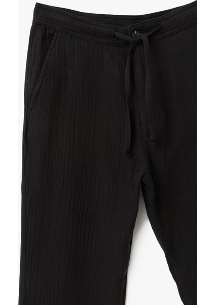 Pamuklu Müslin Chino Cep Detaylı Beli Bağcıklı Jogger Pantolon