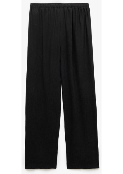 Beli Bağcıklı Geniş Paça Cepli Viskon Karışımlı Pantolon fiyatları