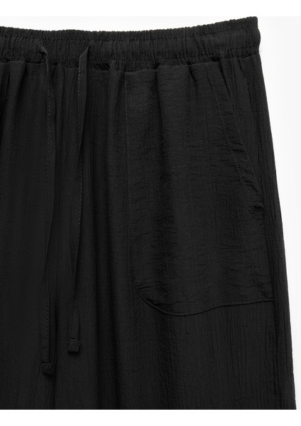 Beli Bağcıklı Geniş Paça Cepli Viskon Karışımlı Pantolon fırsatları