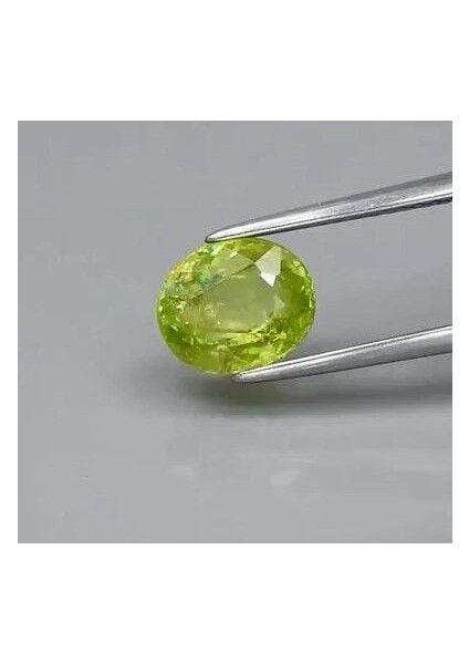 2.10 Ct 7.7x6.5 mm Oval Natural Yellowish Green Sphene Madagascar, High Luster