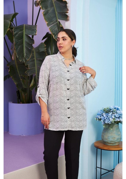 Zarafetin Ipeksi Dokunuşu: Büyük Beden Lacivert Ipek Viskon Tiril Tiril Kumaş Kol Detaylı Gömlek fiyatları