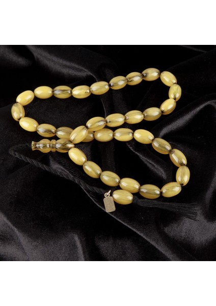 Sıkma Kehribar Beyzi Kesim 9x13.5 mm Tesbih fiyatları