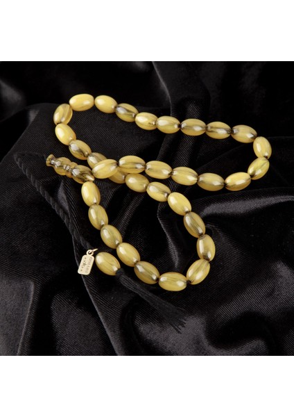 Sıkma Kehribar Beyzi Kesim 9x13.5 mm Tesbih modelleri