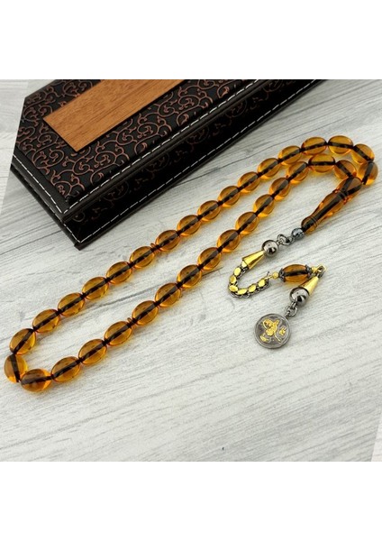 Gümüş Tuğra Püsküllü Arpa Kesim Ateş Kehribar Tesbih