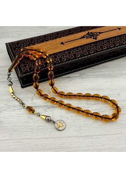 Gümüş Tuğra Püsküllü Arpa Kesim Ateş Kehribar Tesbih fiyatları