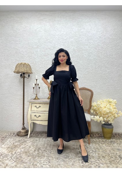 Siyah Fiyonklu Kare Yaka Kloş Poplin Elbise fırsatları