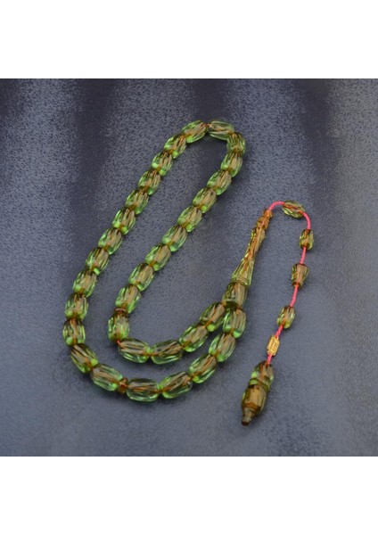 Burhan sağlam Sistem Püsküllü 13x8 mm Oyma İşçilikli İmzalı Ateş Kehribar Tesbih fiyatları