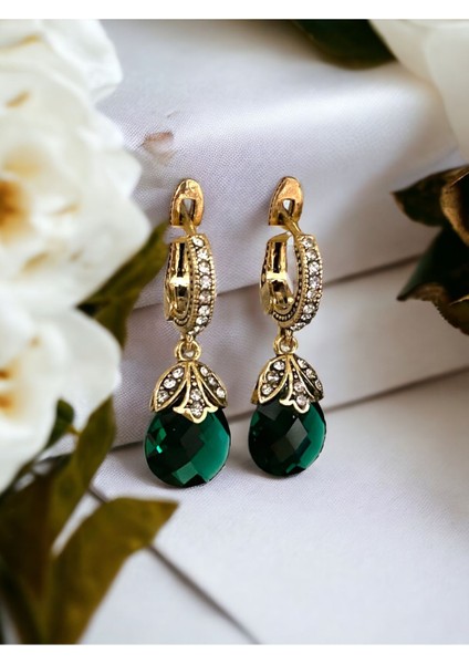 Mor Zirkon Taşlı Kedi Gözü Küpe modelleri