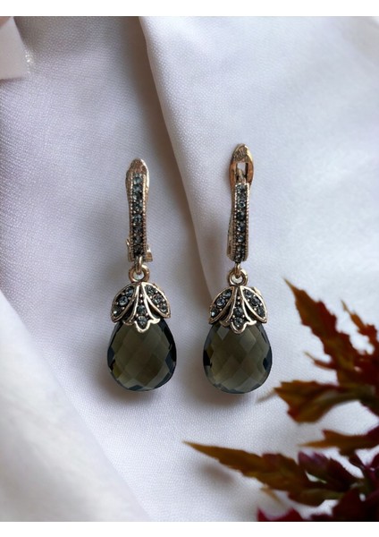 Mor Zirkon Taşlı Kedi Gözü Küpe modelleri