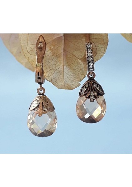 Mor Zirkon Taşlı Kedi Gözü Küpe modelleri