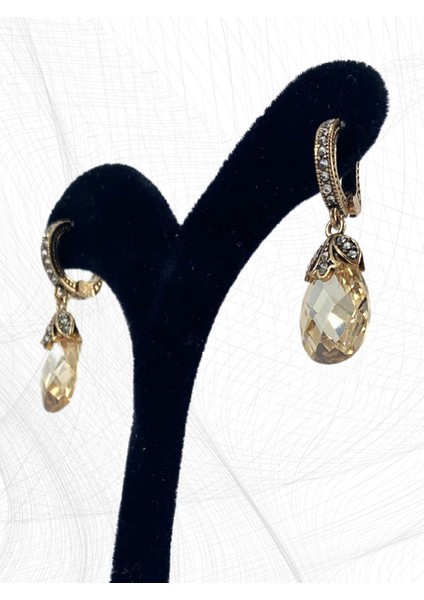 Mor Zirkon Taşlı Kedi Gözü Küpe indirimleri