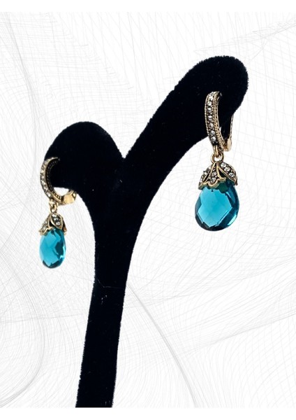 Mor Zirkon Taşlı Kedi Gözü Küpe modelleri