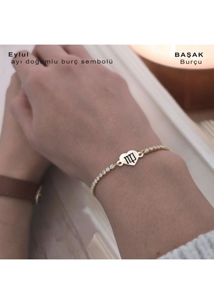 Zarif Kalp Figürlü Parlak Beyaz Taşlı ve 14 Ayar Altın Plakalı Burç Sembolüne Özel Bileklik fiyatları