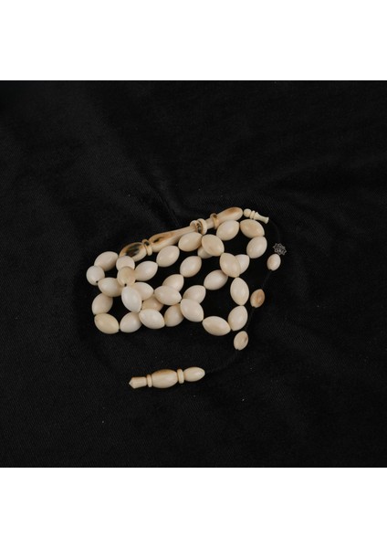 Mineli Mamut Dişi (Tusk) Beyzi Kesim 8X12 mm Tesbih - Beyaz fırsatları