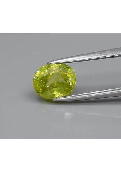 1.88 Ct 7.8x6.3 mm Oval Natural Yellowish Green Sphene Madagascar, Diamond Luster