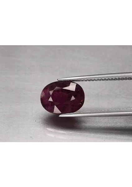 4.87 Ct 10.7x8.2 mm Oval Purplish Red Ruby Tanzania *heated