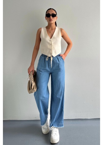 Paçası Püsküllü Straight Fit Denim Pantolon Mavi fiyatları