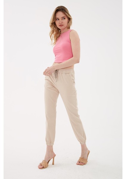 Paçası ve Beli Lastikli Jogger Pantolon Bej fırsatları
