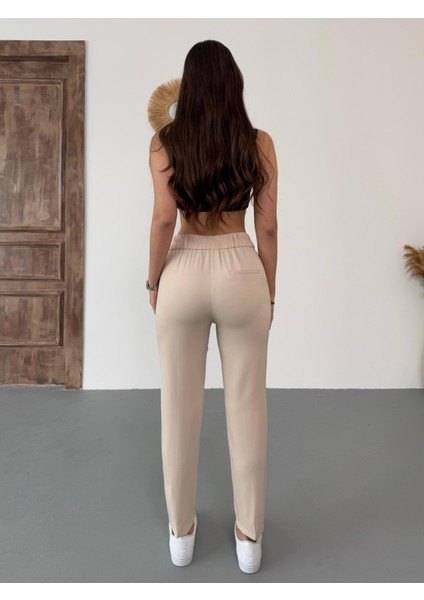 Kadın Yüksek Bel Lastikli Havuç Kesim Pensli Kumaş Pantolon fırsatları