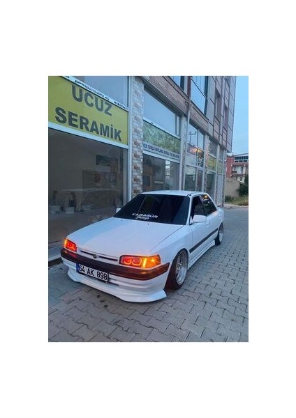 Mazda 323 Sedan Ön Tampon Eki Boyasız Siyah modelleri
