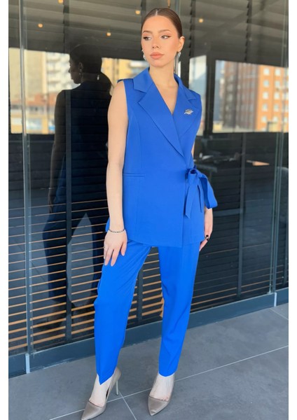 Broş Detaylı Bel Kuşaklı Kadın Yelek Pantolon Ikili Takım fiyatları