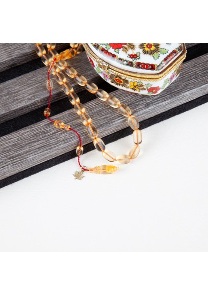 Ateş Kehribar Beyzi Kesim 7X10 mm Tesbih - Şeffaf Uçuk Sarı