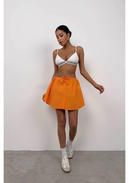 Beli Lastikli Düğmeli Mini Etek