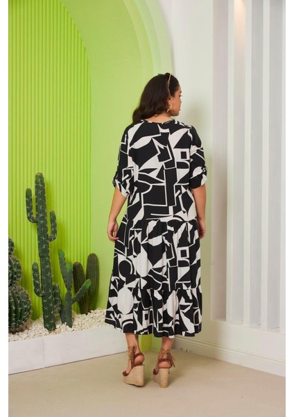 Şıklıkla Rahatlığın Buluştuğu Nokta: Kadın Desenli Büyük Beden Viskon Tiril Tiril Kumaş Siyah Elbise indirimleri