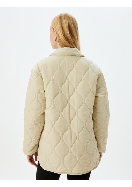 Fermuarlı Cepli Dik Yaka Kapitone Şişme Mont fırsatları