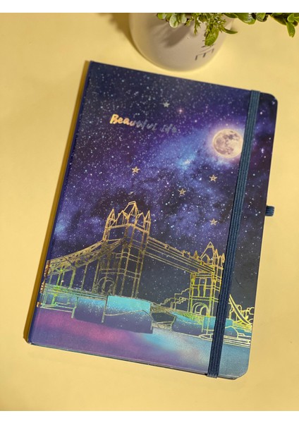 Dolunay Hologramlı Sert Kapak Lastikli Çizgili Defter 14X20CM 80 Yaprak