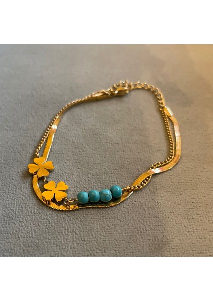 Çelik Gold Mavi Boncuk Yonca Bileklik modelleri