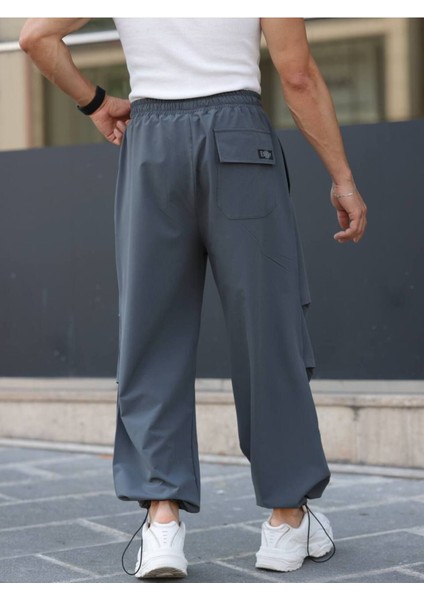 Erkek Yazlık Kumaş Baggy Ayarlanabilir Paça Beli Lastikli Paraşüt Pantolon fiyatları