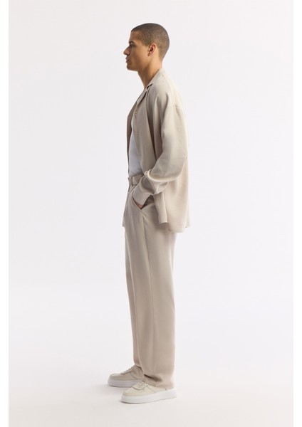 Erkek Bej Klasik Bel Toka Detaylı Soft Touch Baggy Fit Pantolon A51Y3033 fiyatları