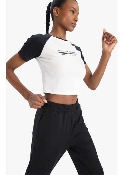 Defactofit Slim Fit Dar Kesim Bisiklet Yaka Slogan Baskılı Sporcu Ribana Kısa Kollu TIŞÖRT D9032AX25SP modelleri