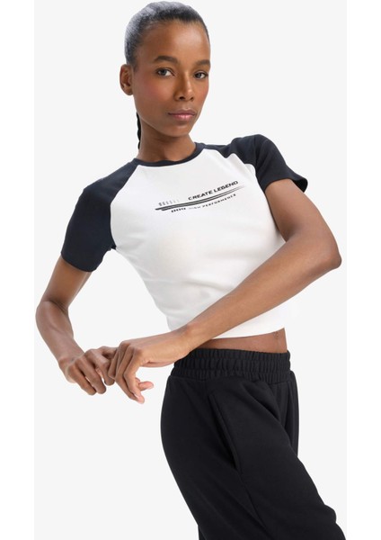 Defactofit Slim Fit Dar Kesim Bisiklet Yaka Slogan Baskılı Sporcu Ribana Kısa Kollu TIŞÖRT D9032AX25SP fırsatları