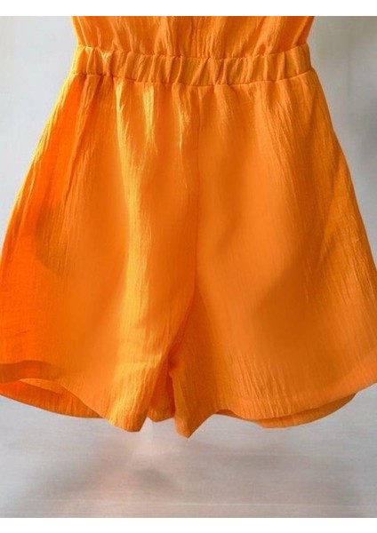 Kız Çocuk Dokuma Göbek Dekolte Detaylı Şort Tulum indirimleri