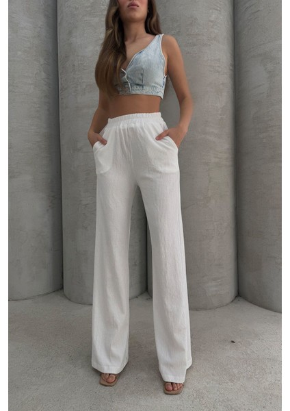 Yumuşacık Yüksel Bel Geniş Paça Likralı Jarse Pantolon Flared