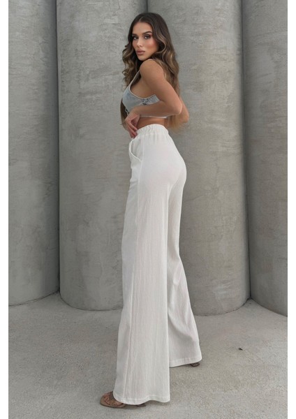 Yumuşacık Yüksel Bel Geniş Paça Likralı Jarse Pantolon Flared fırsatları