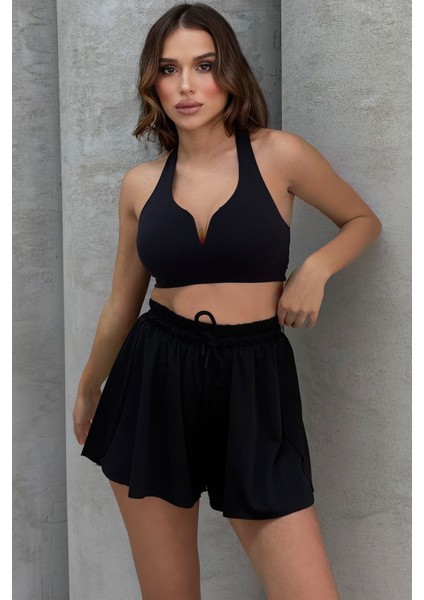 Yüksel Bel Bol Kesim Etek Görünümlü Taytlı Spor Şort