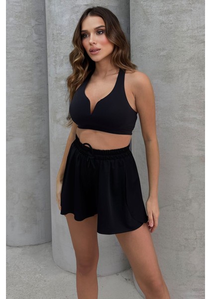 Yüksel Bel Bol Kesim Etek Görünümlü Taytlı Spor Şort fiyatları