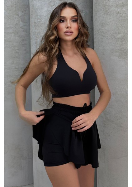 Yüksel Bel Bol Kesim Etek Görünümlü Taytlı Spor Şort fırsatları