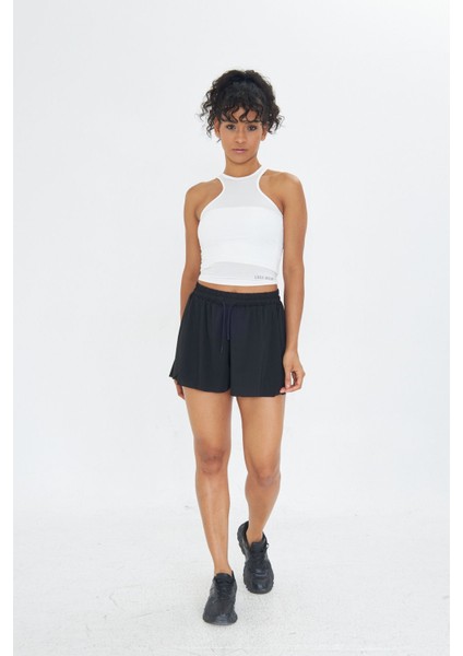 Yüksel Bel Bol Kesim Etek Görünümlü Taytlı Spor Şort indirimleri