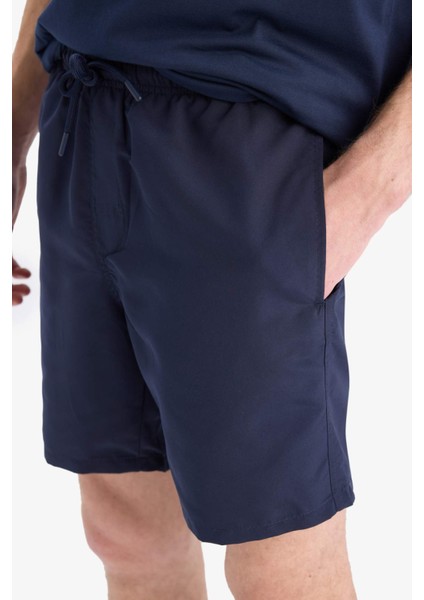 Regular Fit Kısa Boy Cepli File Astarlı Beli Bağcıklı Düz Hafif Kumaş Deniz Şortu E5133AXNS