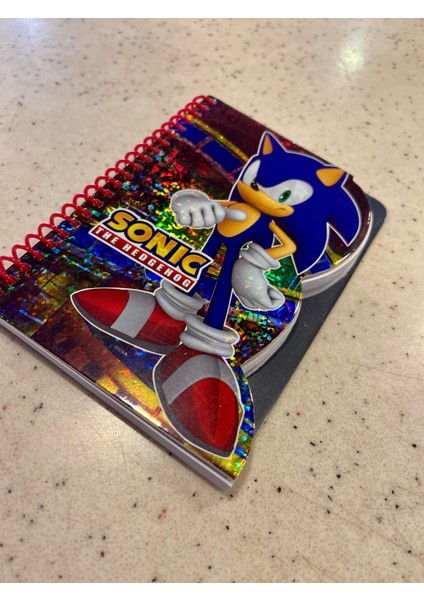 Tmn Lisanslı Sonic Hologramlı Spiralli 80 Yaprak A6 Çizgili Not Defteri 15X11CM