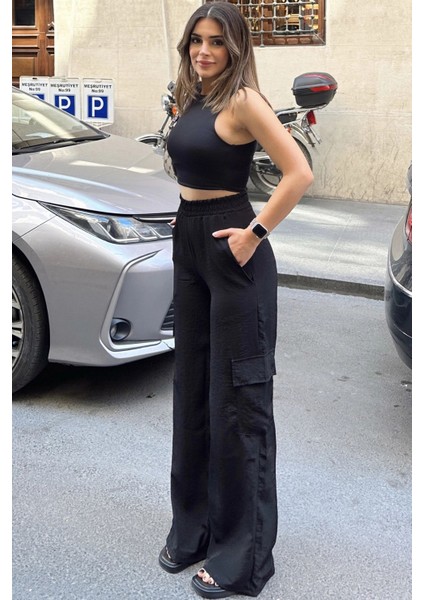 Kadın Siyah Beli Lastikli, Kargo Cepli, Bol Paça Kupra Kumaş Palazzo Pantolon - Tesettüre Uygun