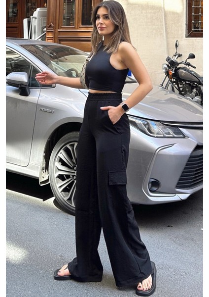 Kadın Siyah Beli Lastikli, Kargo Cepli, Bol Paça Kupra Kumaş Palazzo Pantolon - Tesettüre Uygun modelleri